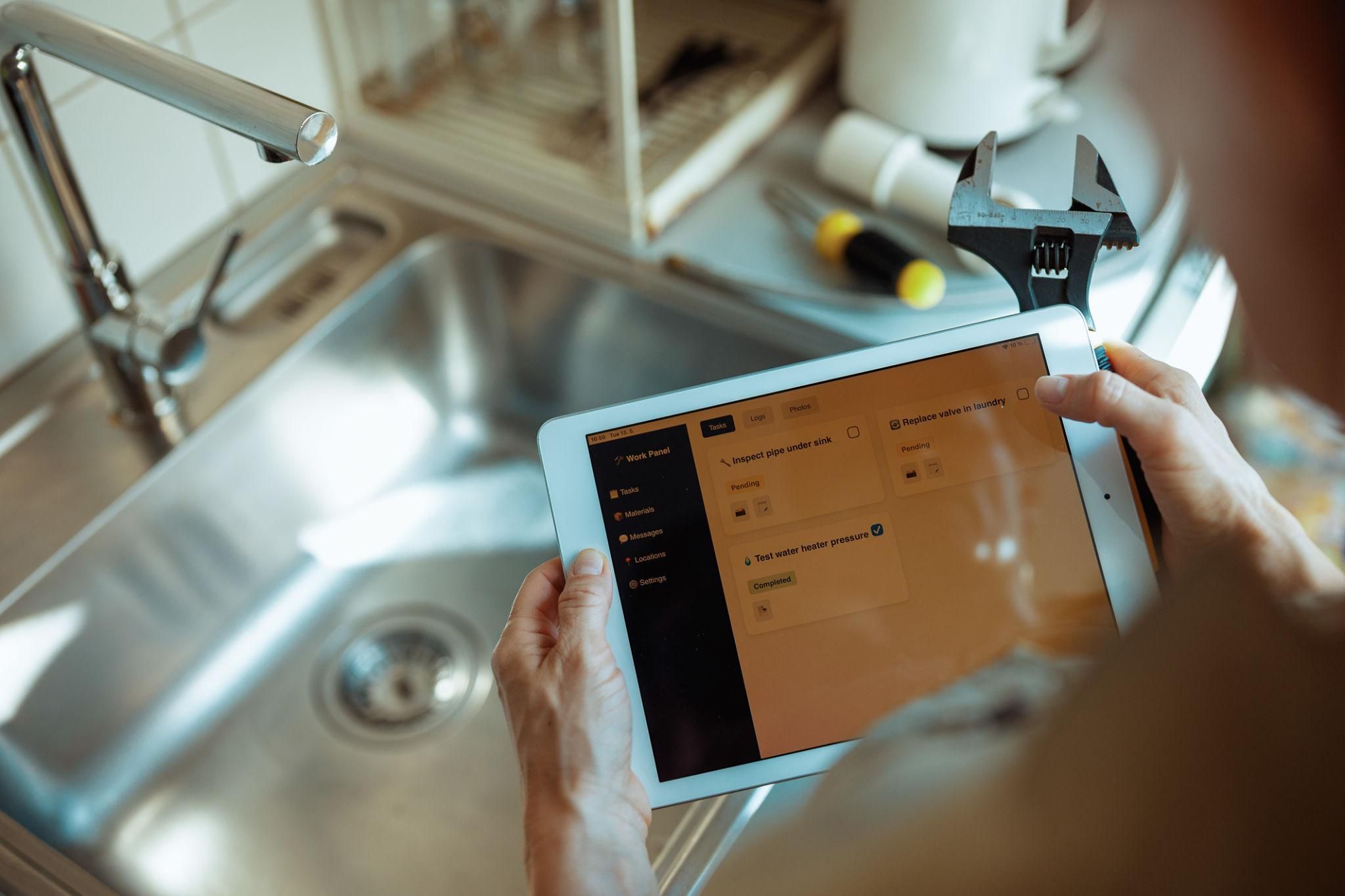 Boise SEO company helping plumbers generate leads using digital marketing tools and analytics on a tablet